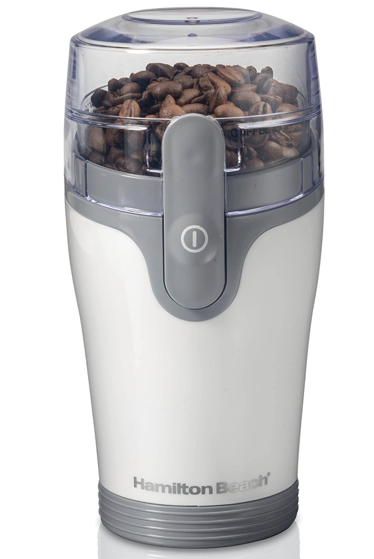 Compact electric coffee bean grinder.
