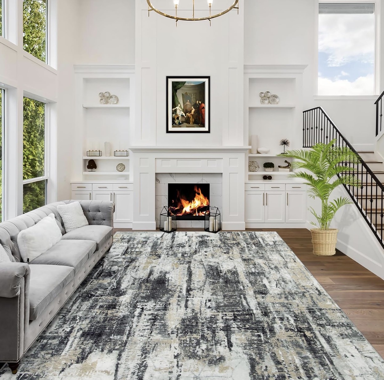 Light grey abstract area rug with black and beige detailing.