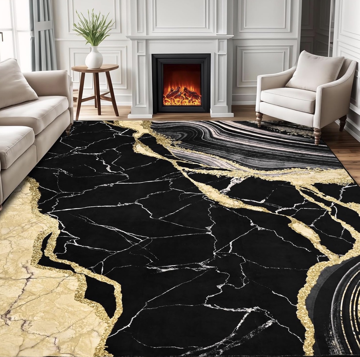 Black cream and gold marble-inspired area rug