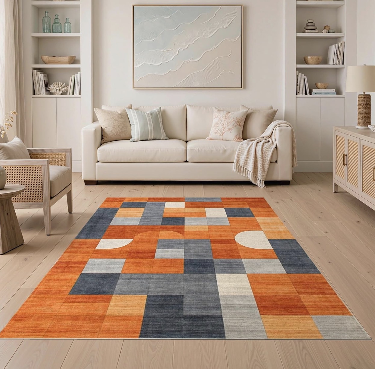 Orange cream and black geometric area rug for a modern fall room